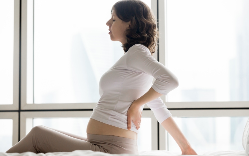 Почему при беременности возникают боли в спине